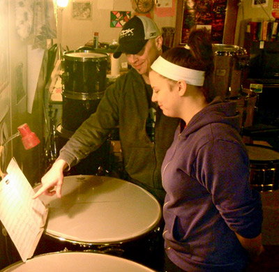 RaKevin teaching a drum lesson